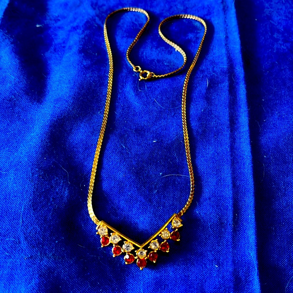 Pretty pretty delicate gold tone necklace with simulated rubys and rhinestones